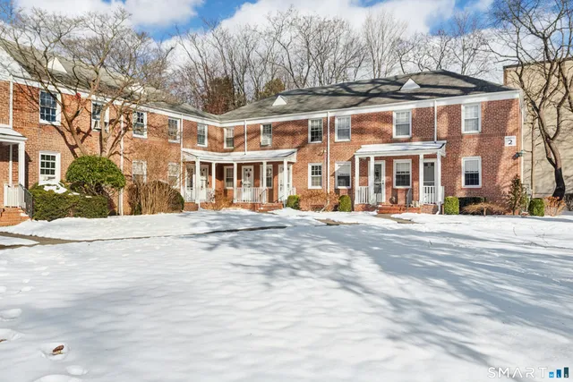 a view of a building with a street
