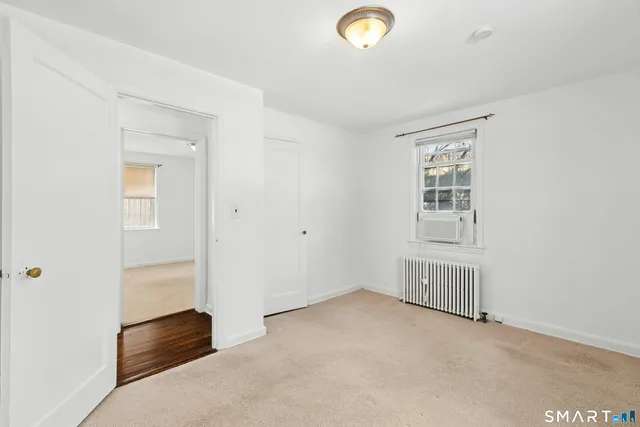 a view of empty room with windows