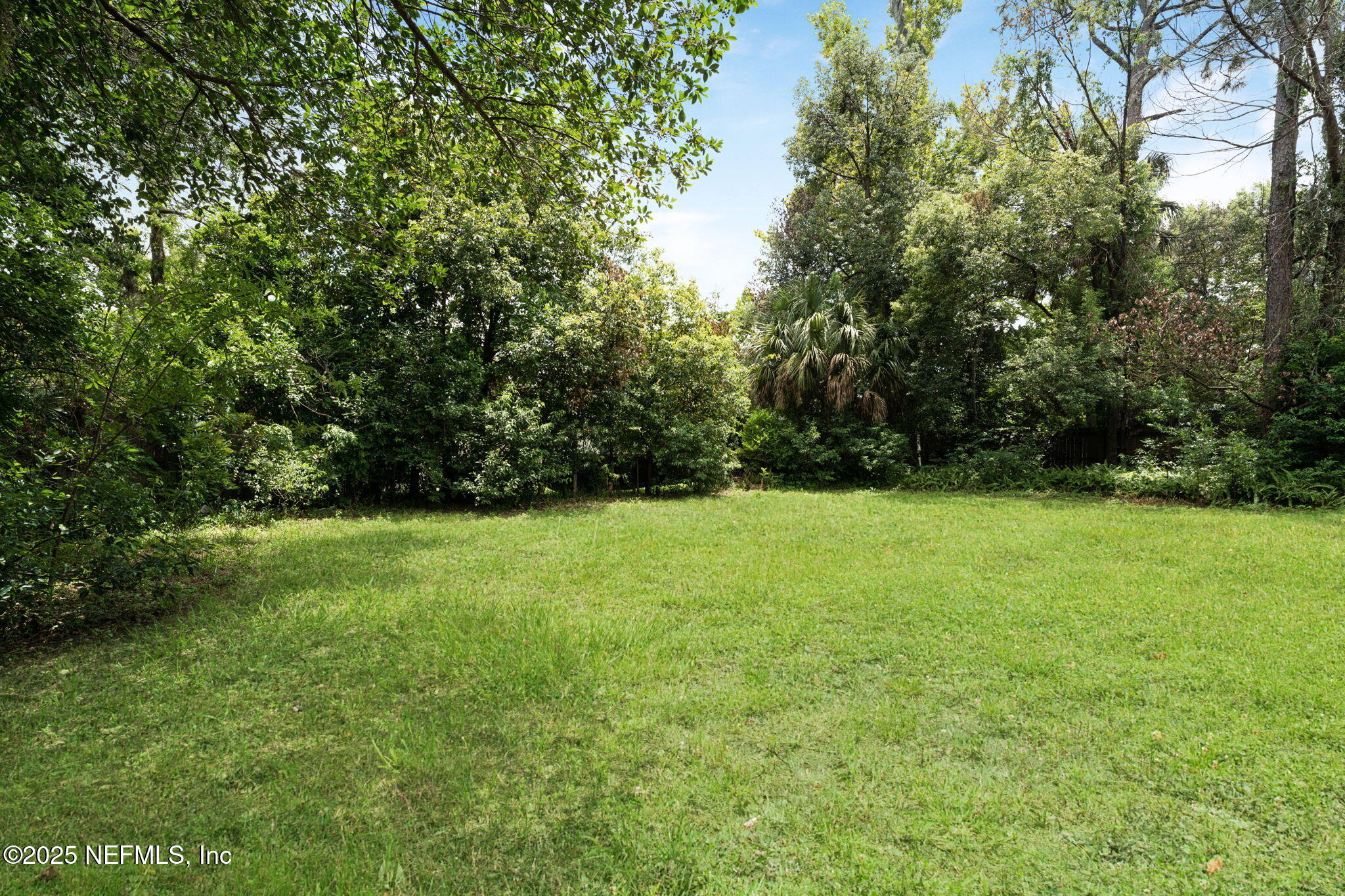 9155 Sibbald Road Jacksonville, FL 32208 - Photo 22 of 22 a view of yard with green space