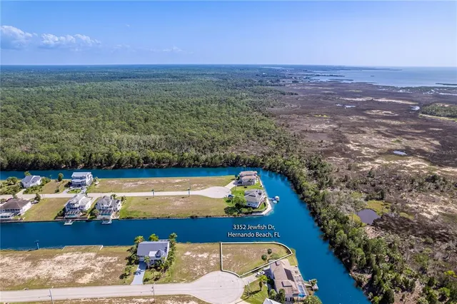 a view of a lake with building in front of it