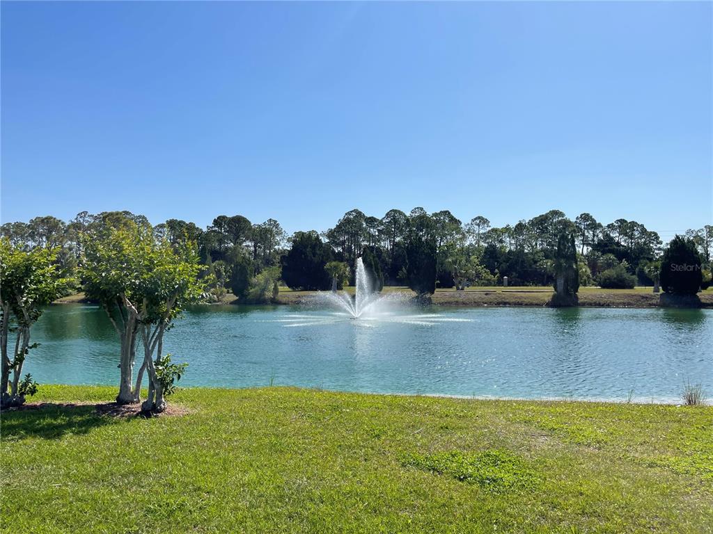 3352 Jew Fish Drive Hernando Beach, FL 34607 - Photo 22 of 23 a view of a lake with houses in the background