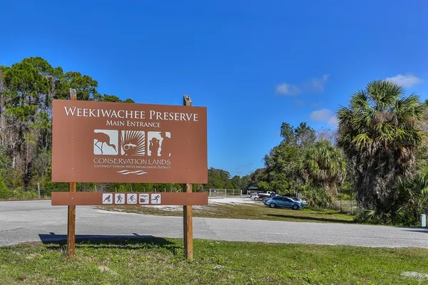 a sign on the side of the road