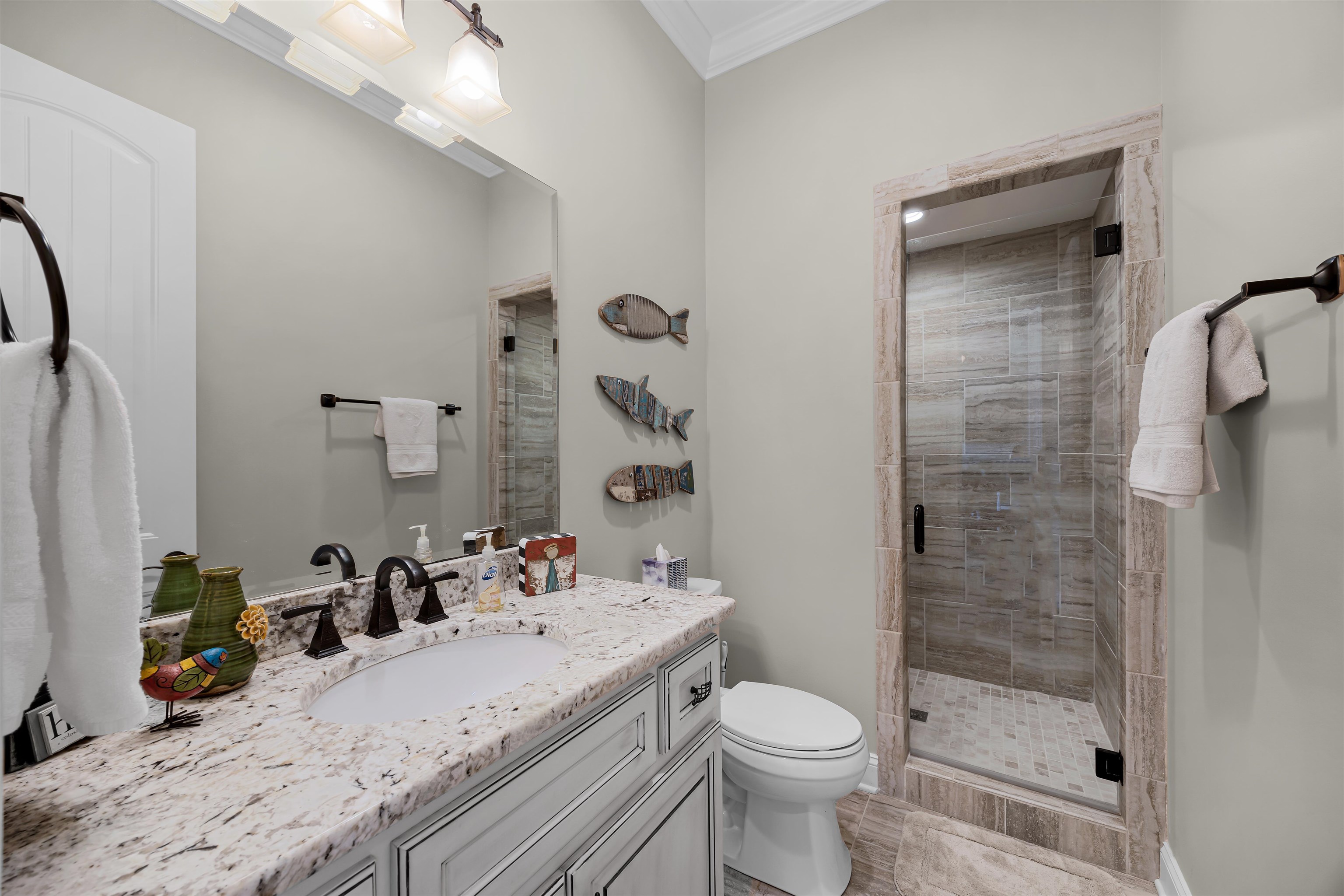 45 Pinnacle Pointe Savannah, TN 38372 - Photo 26 of 30 Full bathroom with vanity, a stall shower, and crown molding