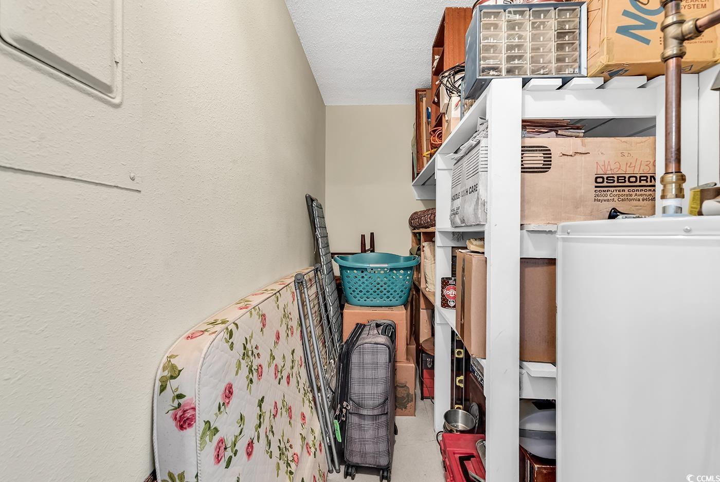 3796 Otter Street, Unit 3796 Myrtle Beach, SC 29577 - Photo 17 of 38 Storage room with water heater