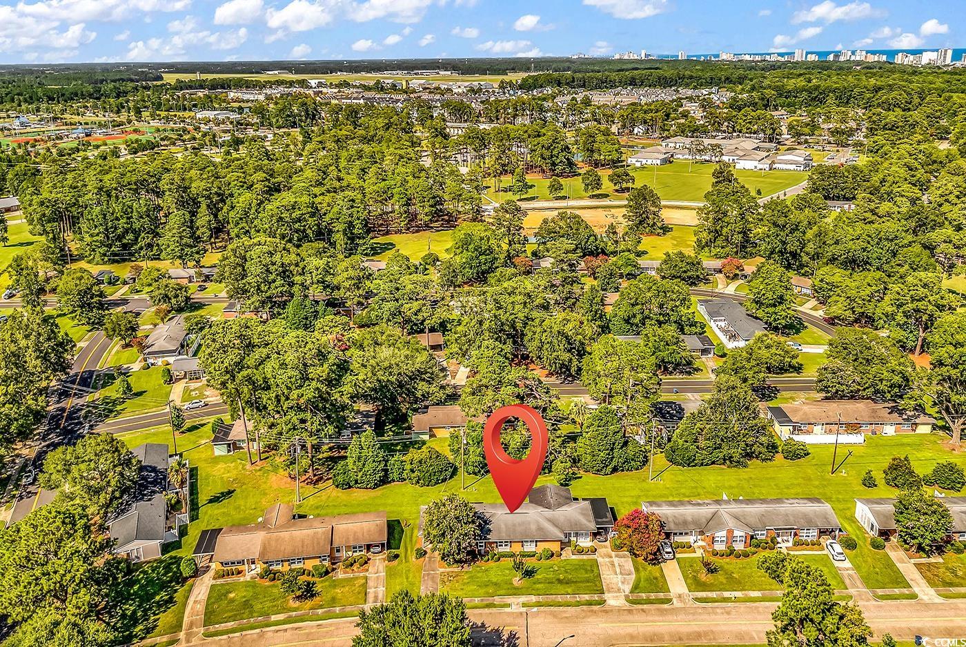 3796 Otter Street, Unit 3796 Myrtle Beach, SC 29577 - Photo 33 of 38 Aerial view of residential area featuring a tree filled landscape
