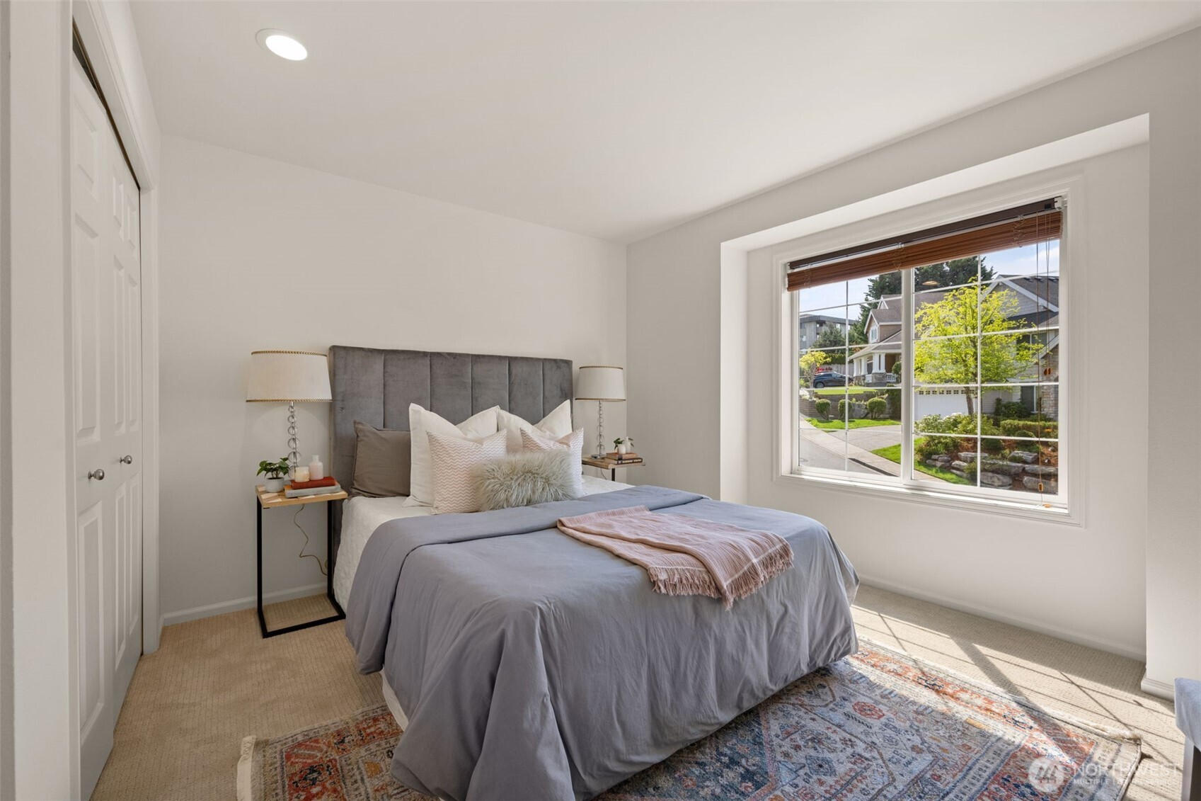 1206 South 36th Place Renton, WA 98055 - Photo 27 of 37 a bedroom with a bed and a window