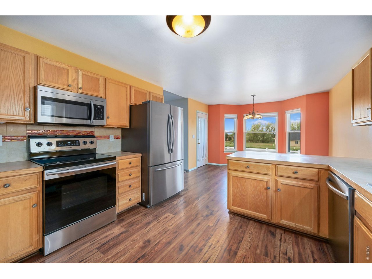 17447 Margil Road Mead, CO 80542 - Photo 8 of 27 Large kitchen with S/S appliances