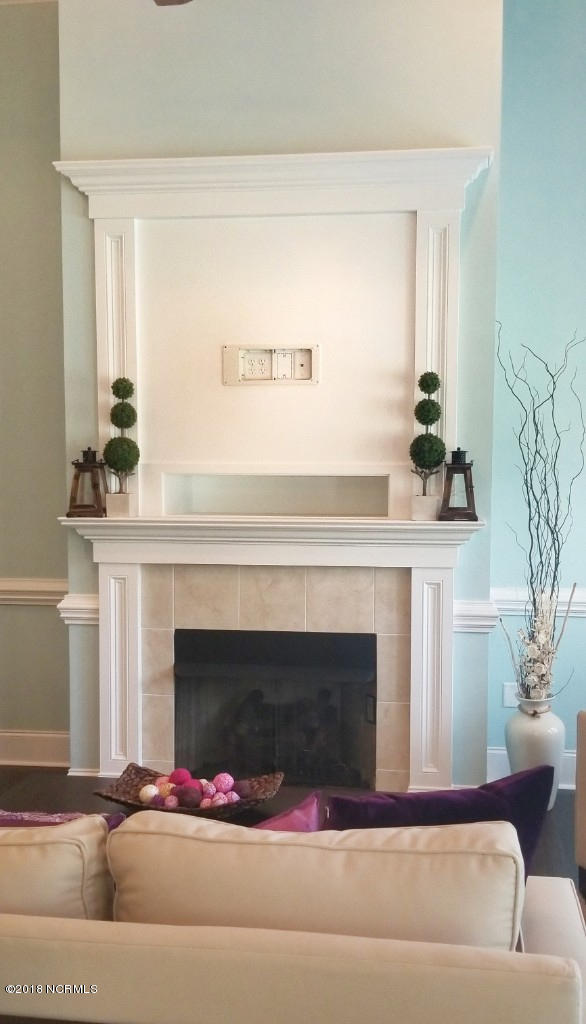 118 Olde Point Road Hampstead, NC 28443 - Photo 21 of 53 Gas Fireplace features custom Mantel with built-in wiring for Cable TV and Accessories. Move in and hook it all up in a snap! No exposed wires!!