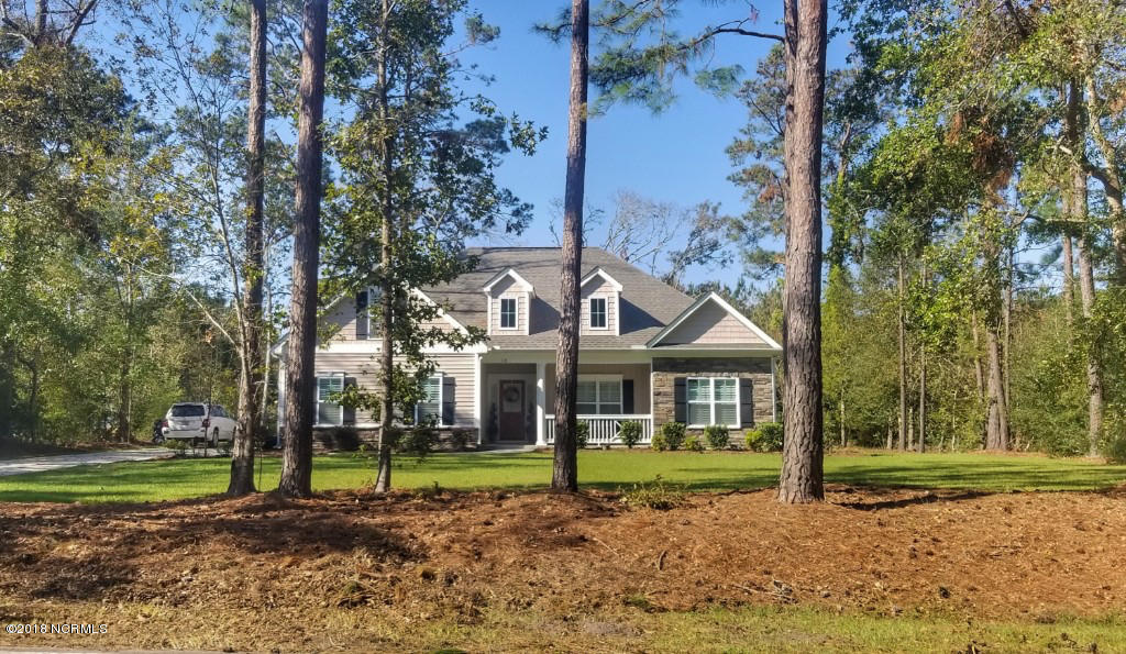 118 Olde Point Road Hampstead, NC 28443 - Photo 3 of 53 Better than new! Established Tree lined 1/2 acre property just minutes to beaches, shopping, and Olde Point Golf and Swim is right up the street!