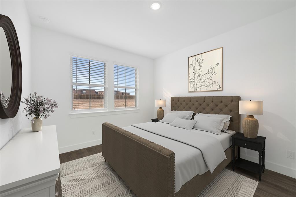 1002 Ashcroft Lane Justin, TX 76247 - Photo 18 of 29 a bedroom with bed and a window