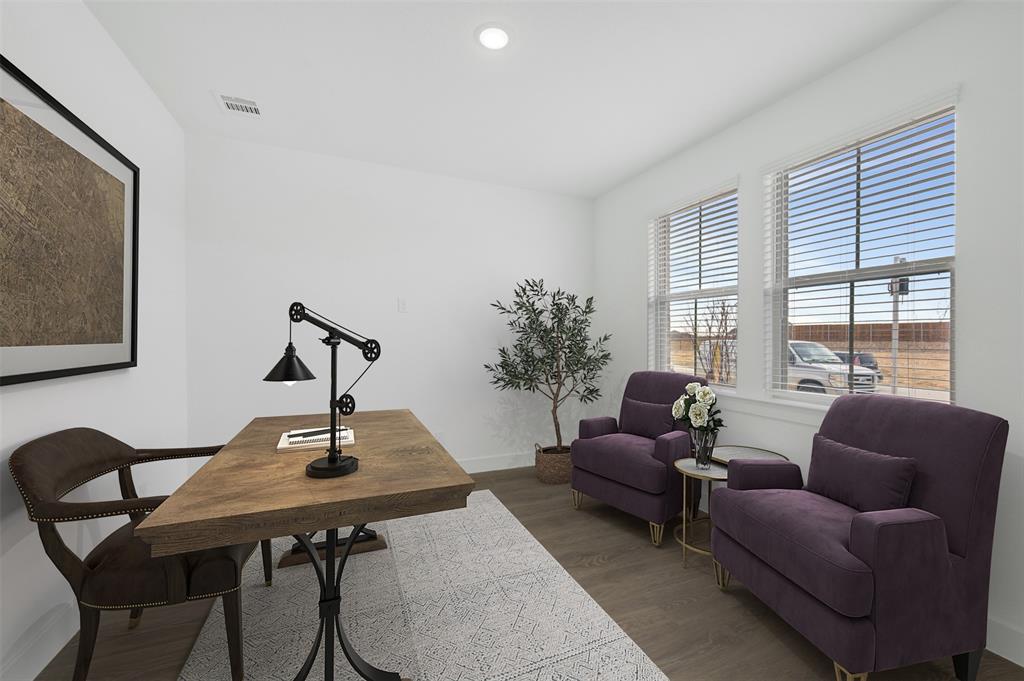 1002 Ashcroft Lane Justin, TX 76247 - Photo 20 of 29 a living room with furniture and a window