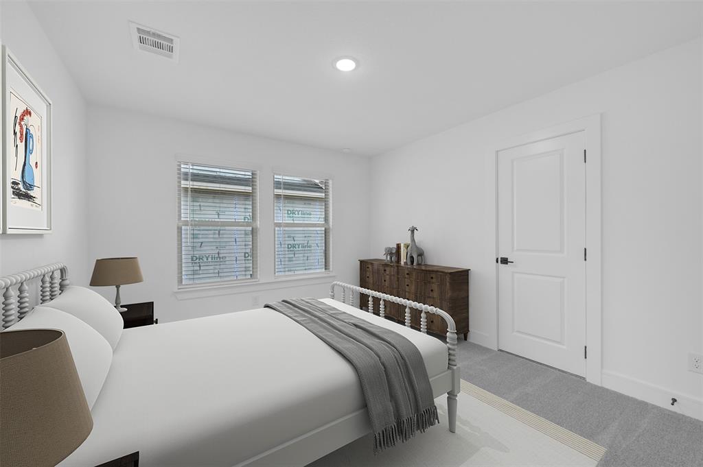 1002 Ashcroft Lane Justin, TX 76247 - Photo 24 of 29 a bedroom with a bed and a window