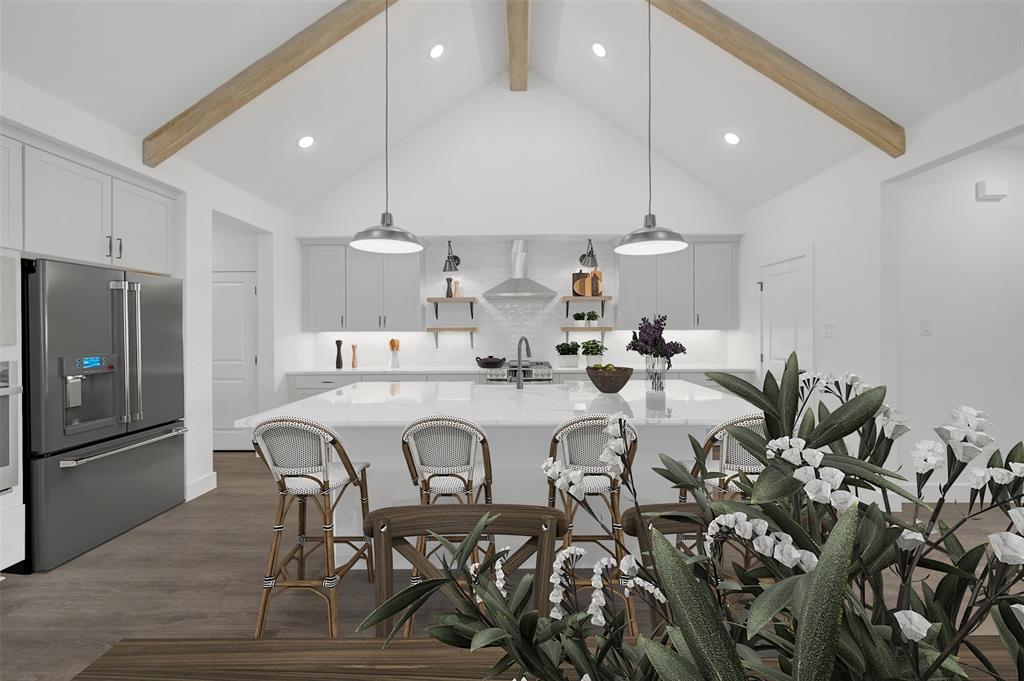 1002 Ashcroft Lane Justin, TX 76247 - Photo 9 of 29 a very nice looking dining room with stainless steel appliances a dining table chairs and couches
