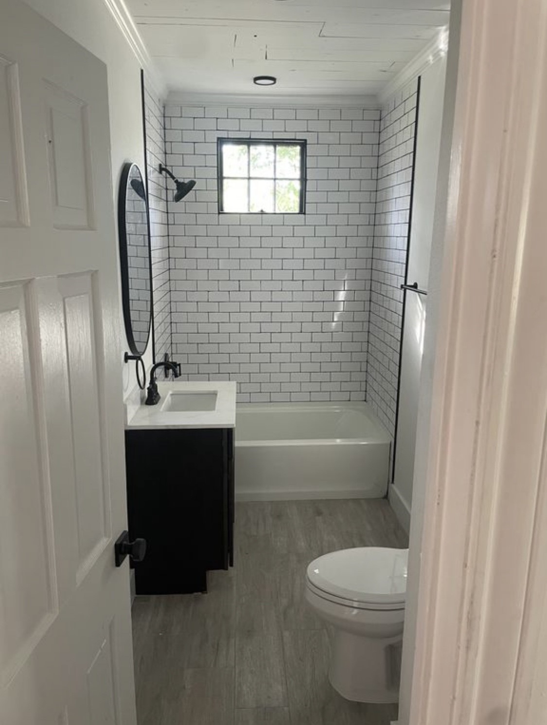 321 South Arcola Street Angleton, TX 77515 - Photo 6 of 7 a bathroom with a sink toilet and shower