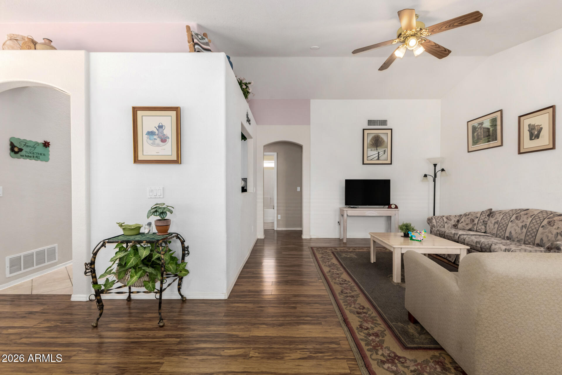 79 West Gail Drive Gilbert, AZ 85233 - Photo 11 of 37 Living room, wood floors ceiling fan