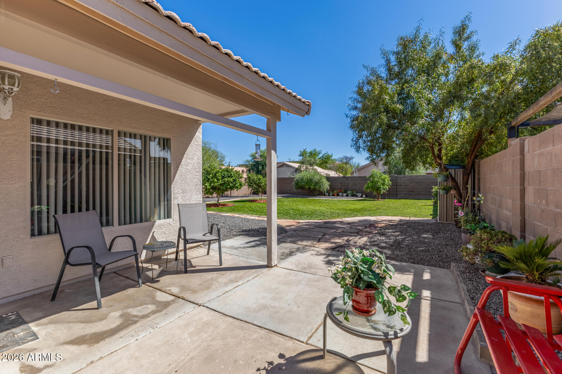 79 West Gail Drive Gilbert, AZ 85233 - Photo 30 of 37 Covered patio, concrete slab yard
