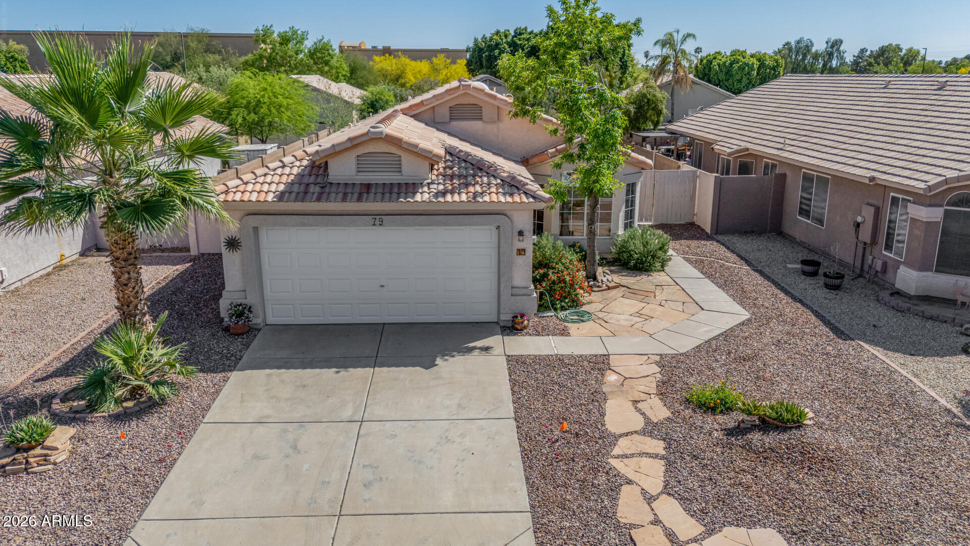 79 West Gail Drive Gilbert, AZ 85233 - Photo 8 of 37 Front elevated, tile roof palms