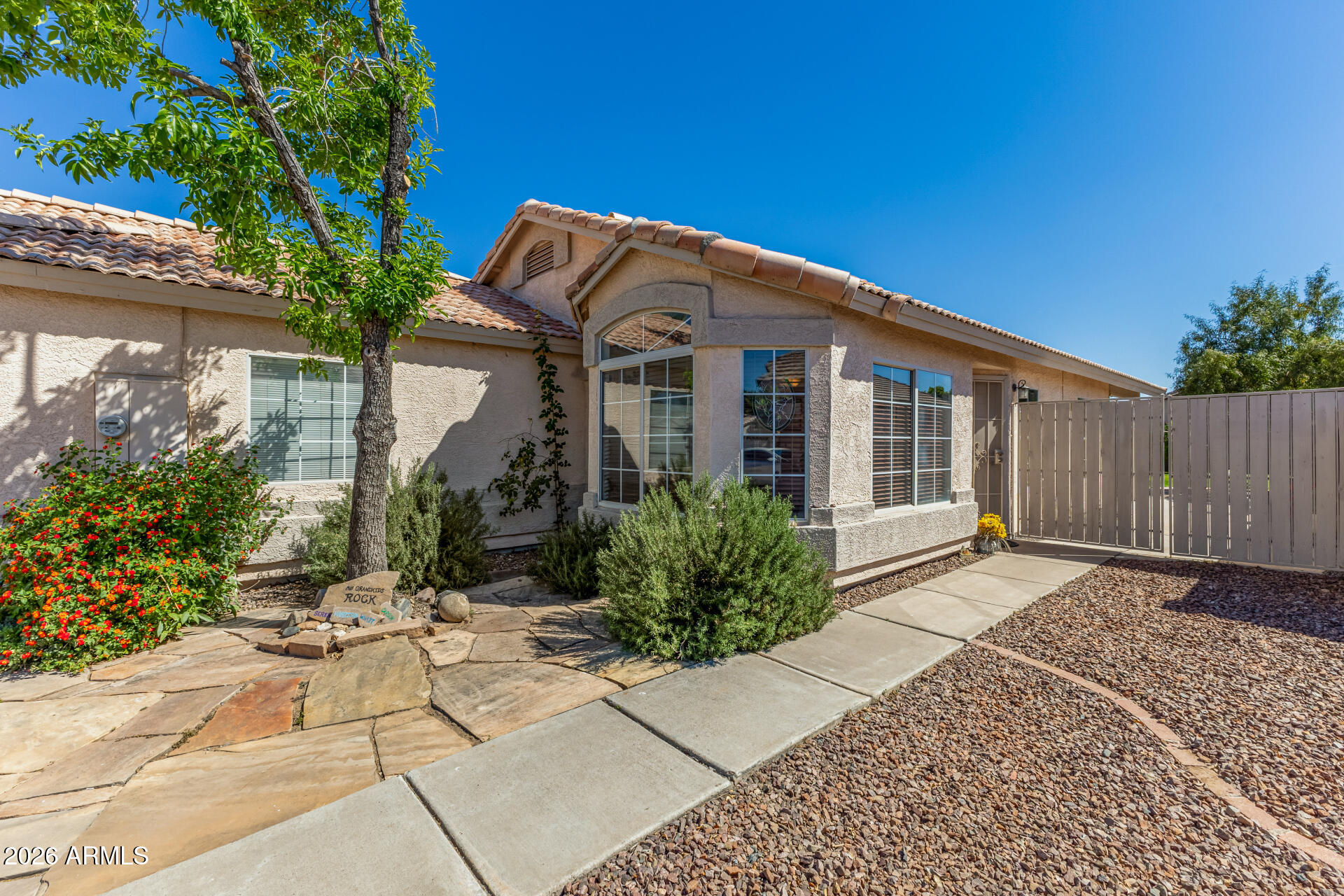79 West Gail Drive Gilbert, AZ 85233 - Photo 10 of 37 Front entry, arched window path
