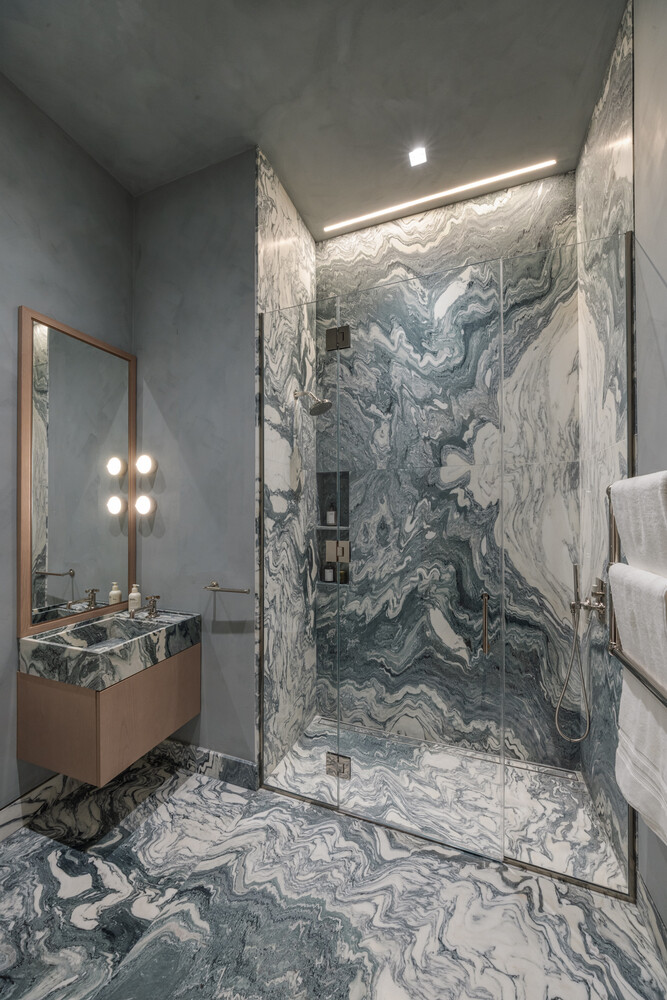 85 Worth Street, Unit 3 Manhattan, NY 10013 - Photo 9 of 14 a bathroom with a sink and a mirror