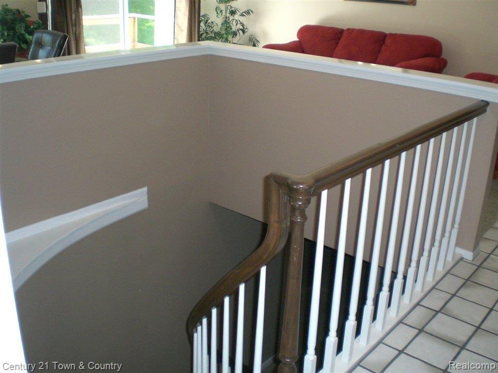 631 Deerfield Court Rochester, MI 48309 - Photo 13 of 25 Basement Staircase