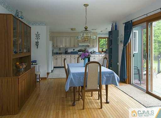 115 Hollow Road Skillman, NJ 08558 - Photo 5 of 8 a view of a dining room with furniture window and wooden floor