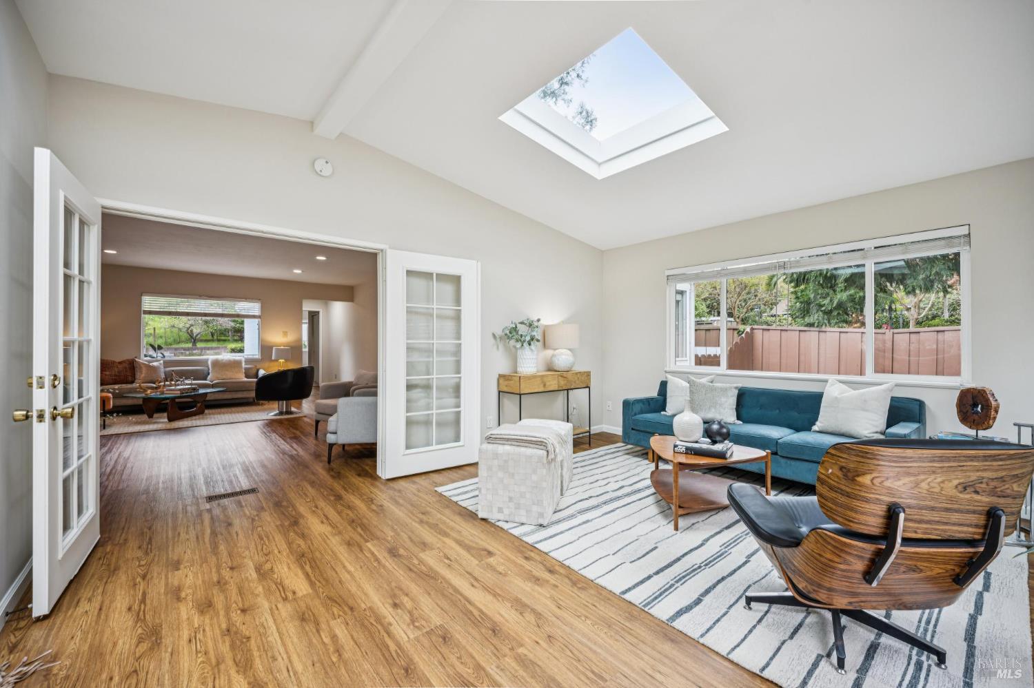 35 San Pablo Avenue San Rafael, CA 94903 - Photo 12 of 43 a living room with furniture and a wooden floor