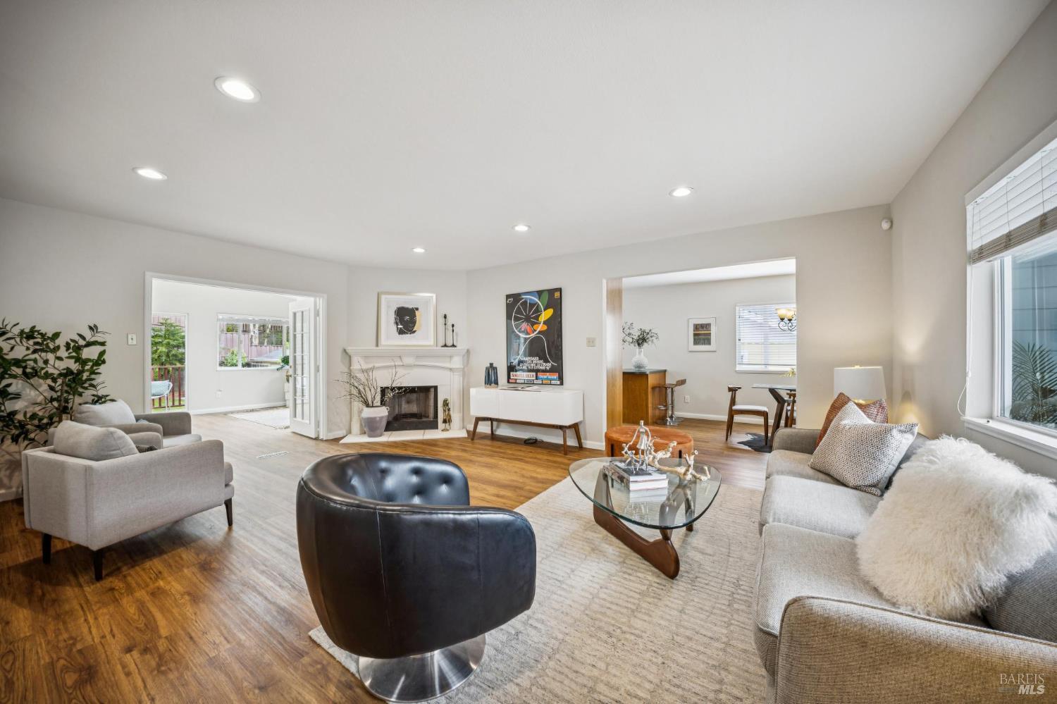 35 San Pablo Avenue San Rafael, CA 94903 - Photo 3 of 43 a living room with furniture and a wooden floor