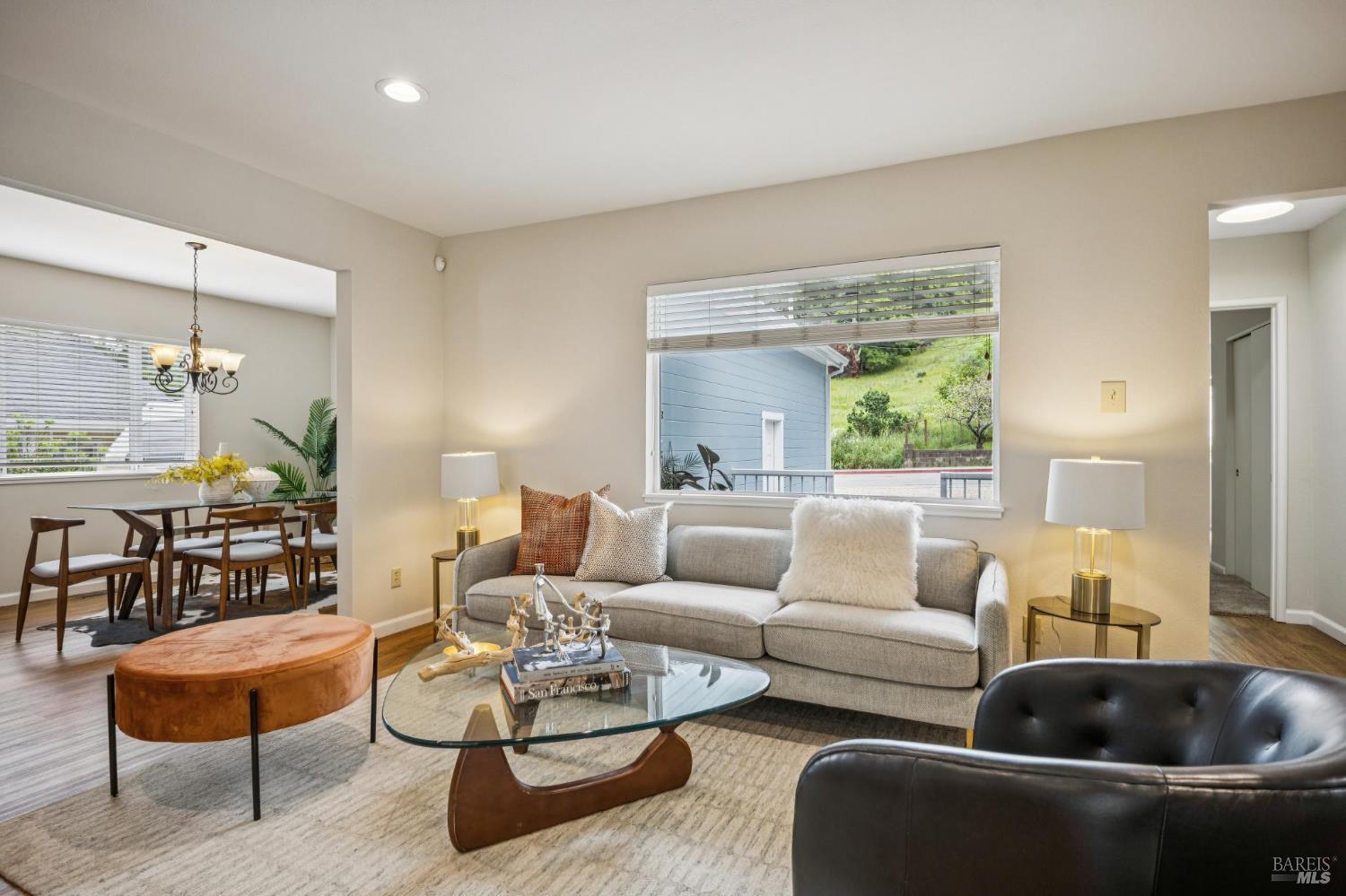 35 San Pablo Avenue San Rafael, CA 94903 - Photo 4 of 43 a living room with furniture and a potted plant