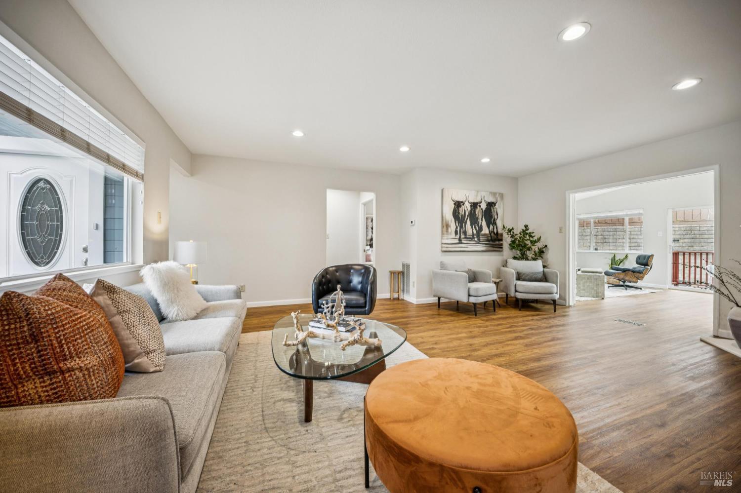 35 San Pablo Avenue San Rafael, CA 94903 - Photo 5 of 43 a living room with furniture and a wooden floor