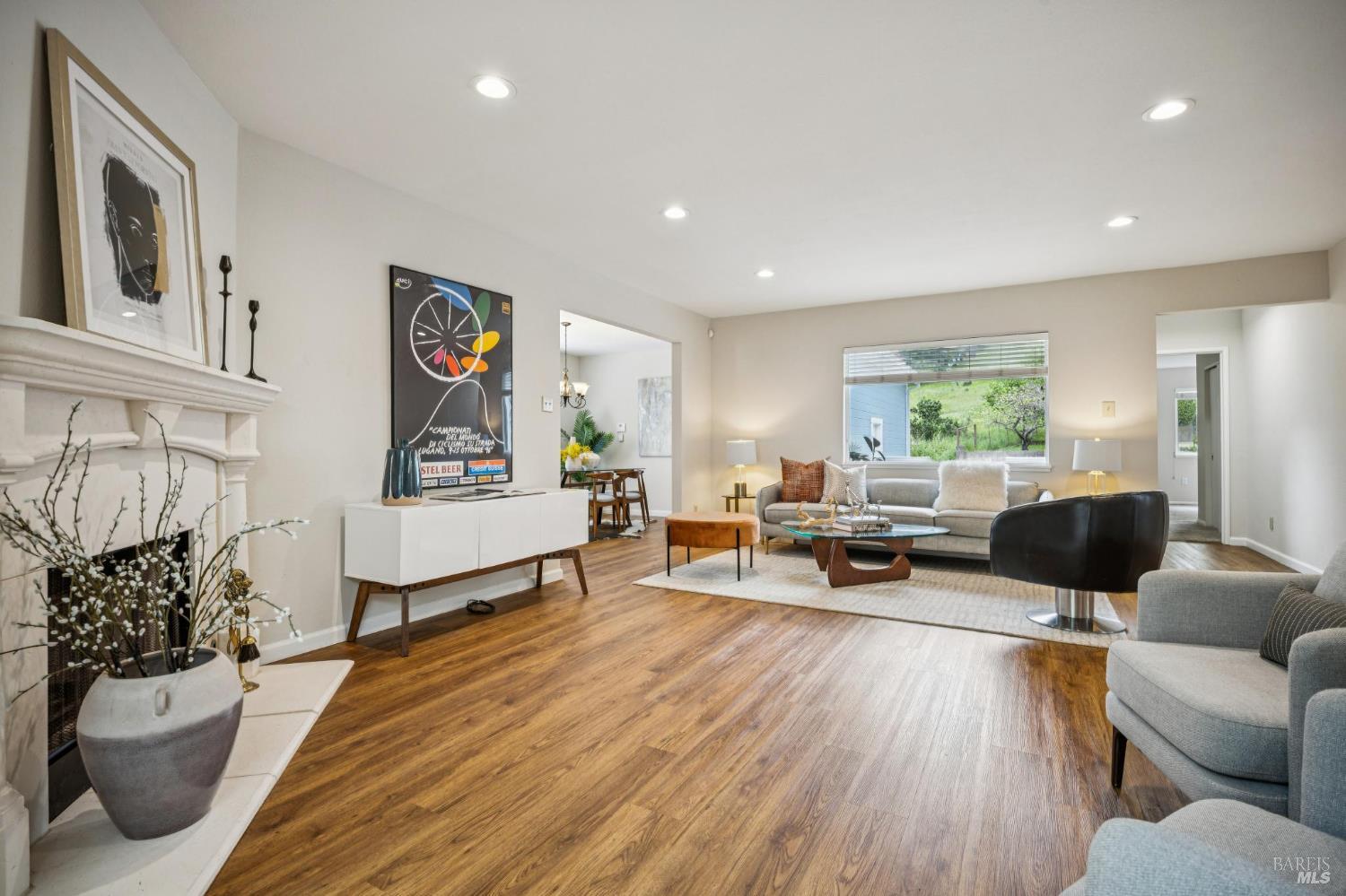 35 San Pablo Avenue San Rafael, CA 94903 - Photo 6 of 43 a living room with furniture and a wooden floor