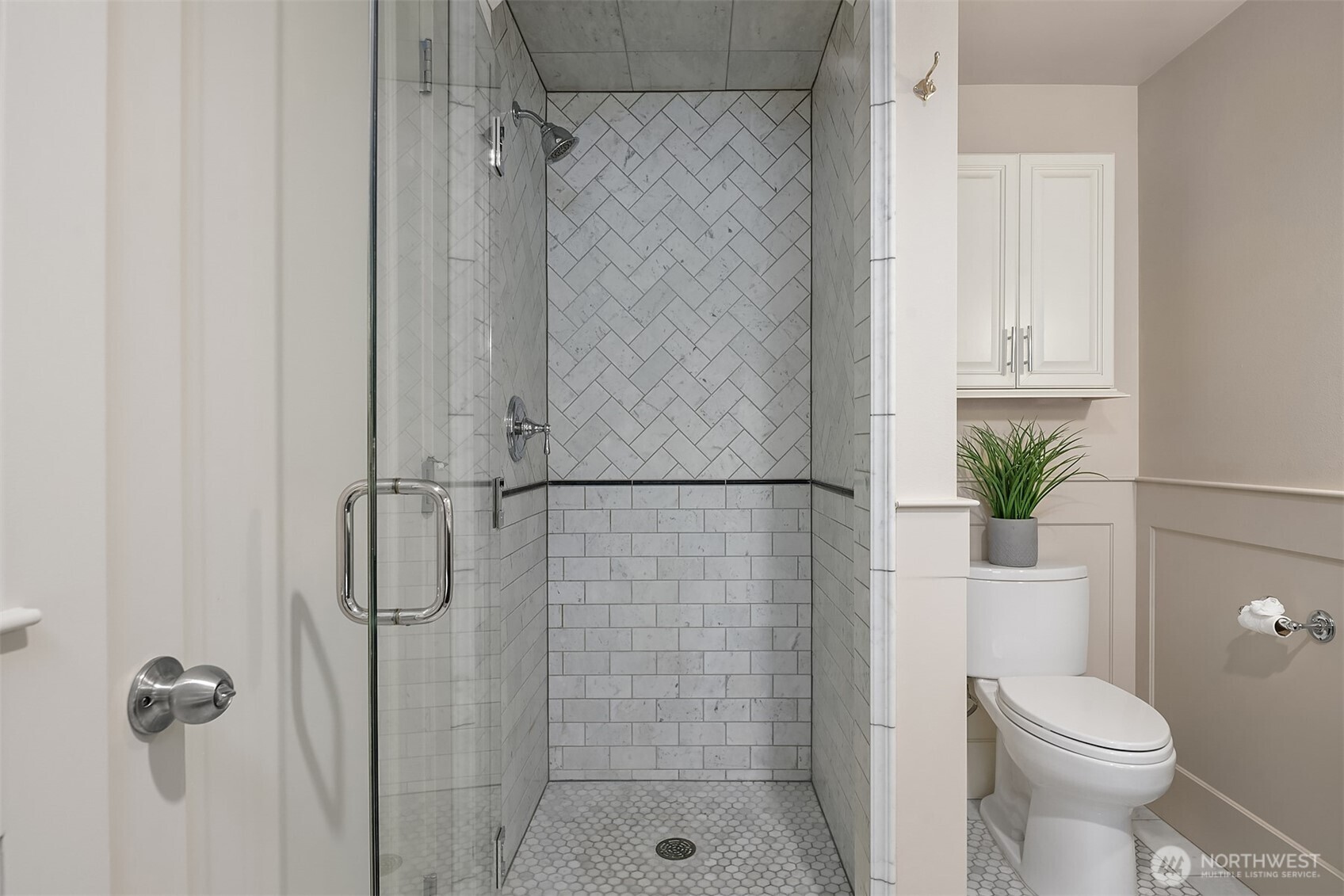 527 11th Avenue East, Unit A Seattle, WA 98102 - Photo 19 of 37 a bathroom with a shower and a toilet