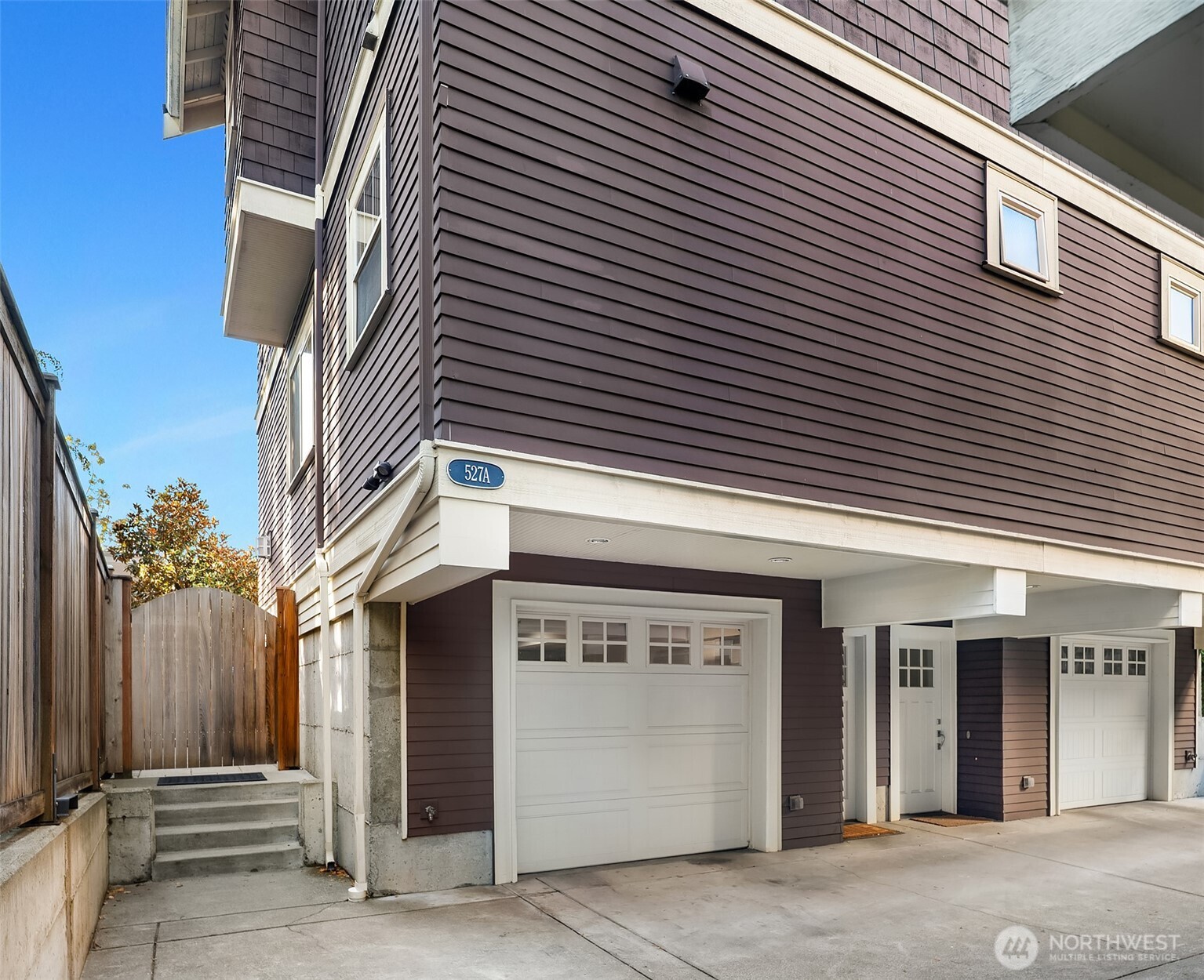 527 11th Avenue East, Unit A Seattle, WA 98102 - Photo 29 of 37 a view of a building with stairs and a garage