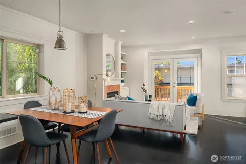 a view of a dining room with furniture window and outside view