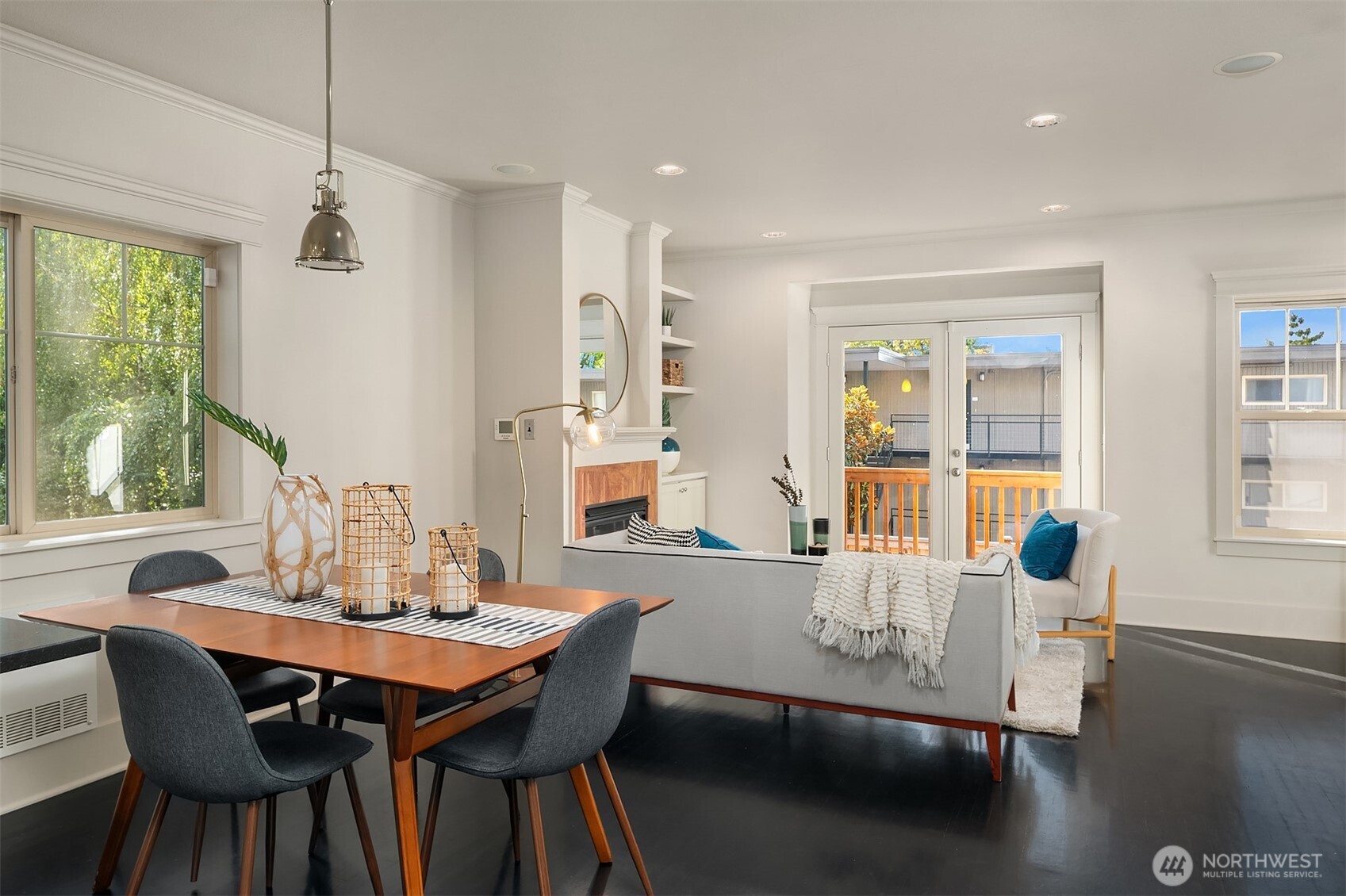 527 11th Avenue East, Unit A Seattle, WA 98102 - Photo 8 of 37 a view of a dining room with furniture window and outside view