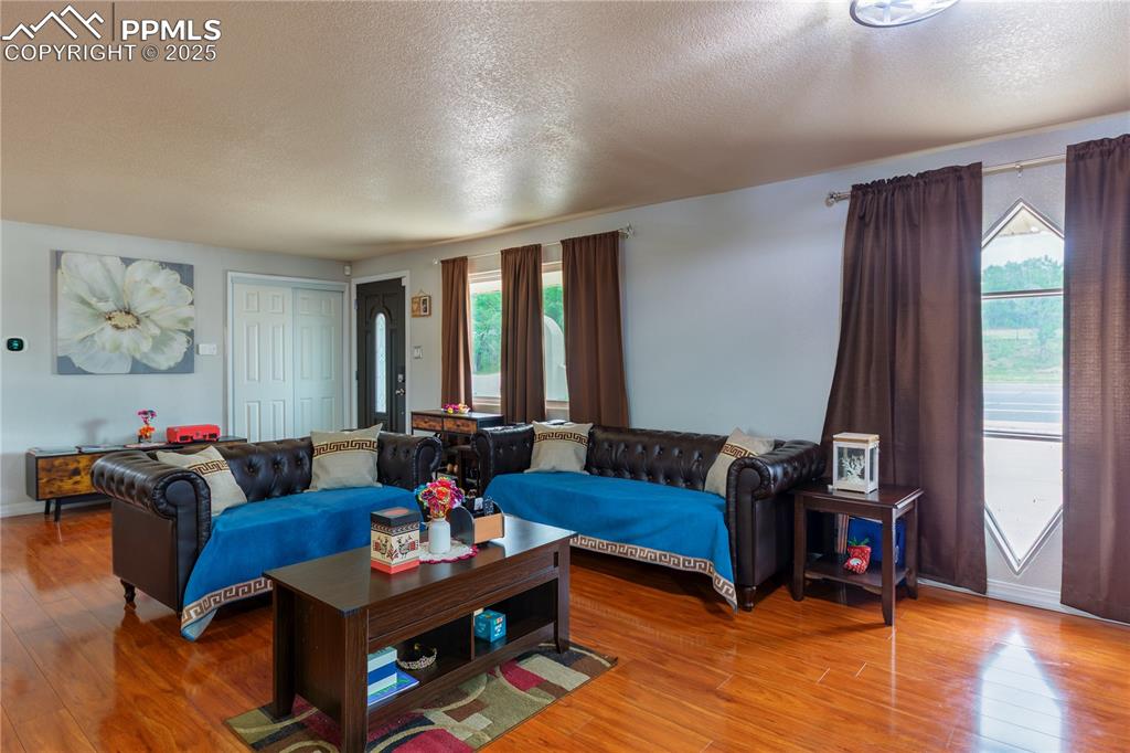 2205 Airport Road Colorado Springs, CO 80910 - Photo 17 of 40 a living room with furniture and a window