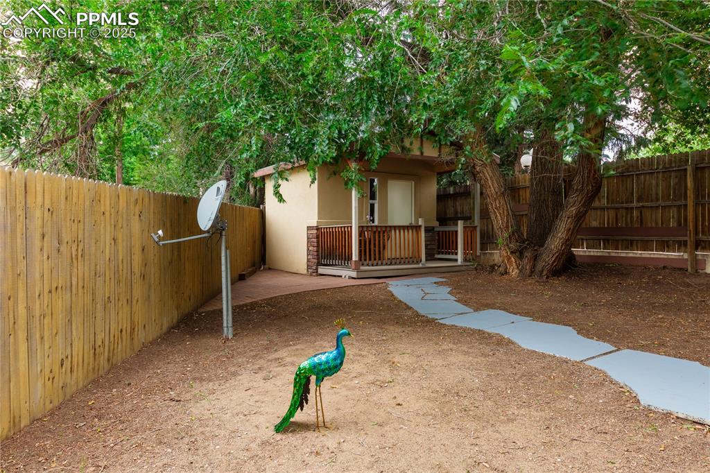 2205 Airport Road Colorado Springs, CO 80910 - Photo 39 of 40 a house with trees in front of it