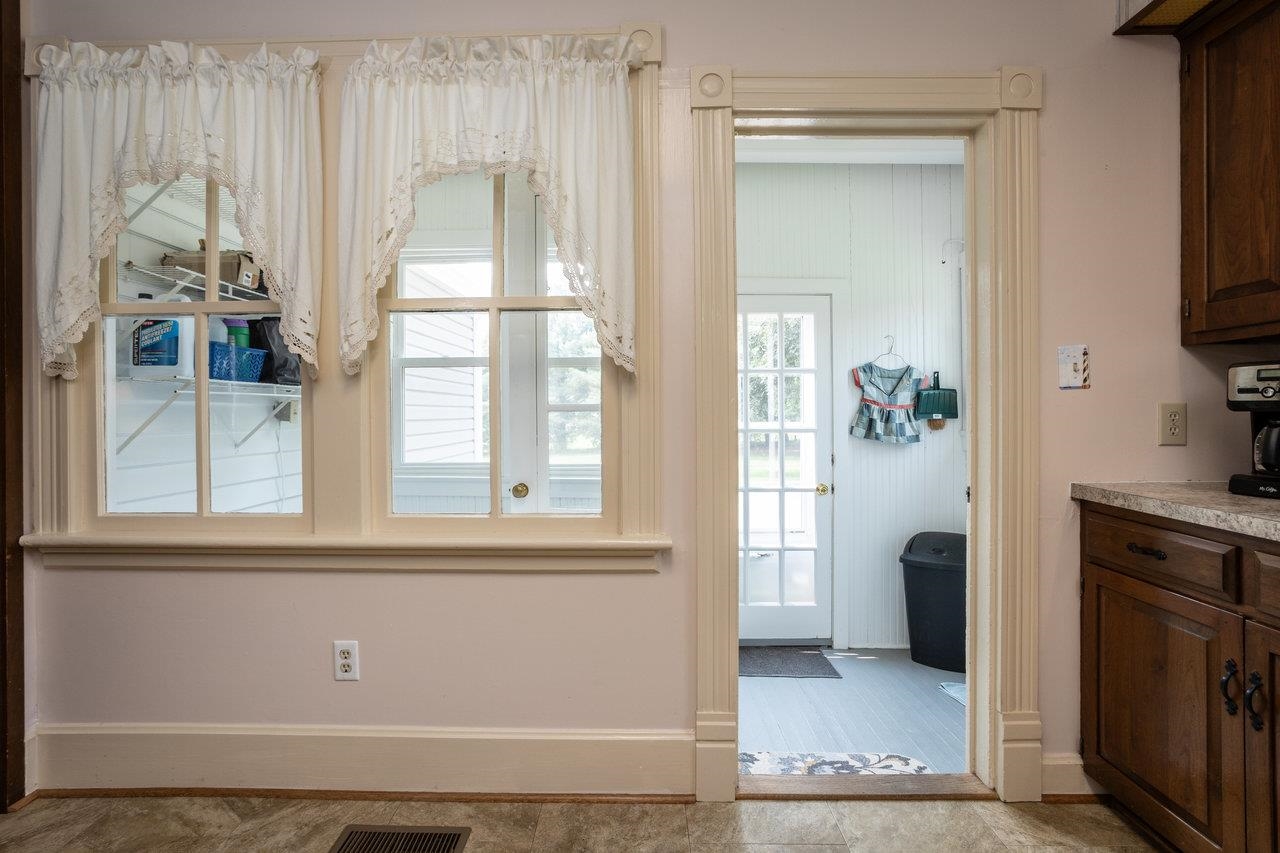 7231 Spring Creek Road Bridgewater, VA 22812 - Photo 22 of 74 a view of a kitchen with an empty room and a window