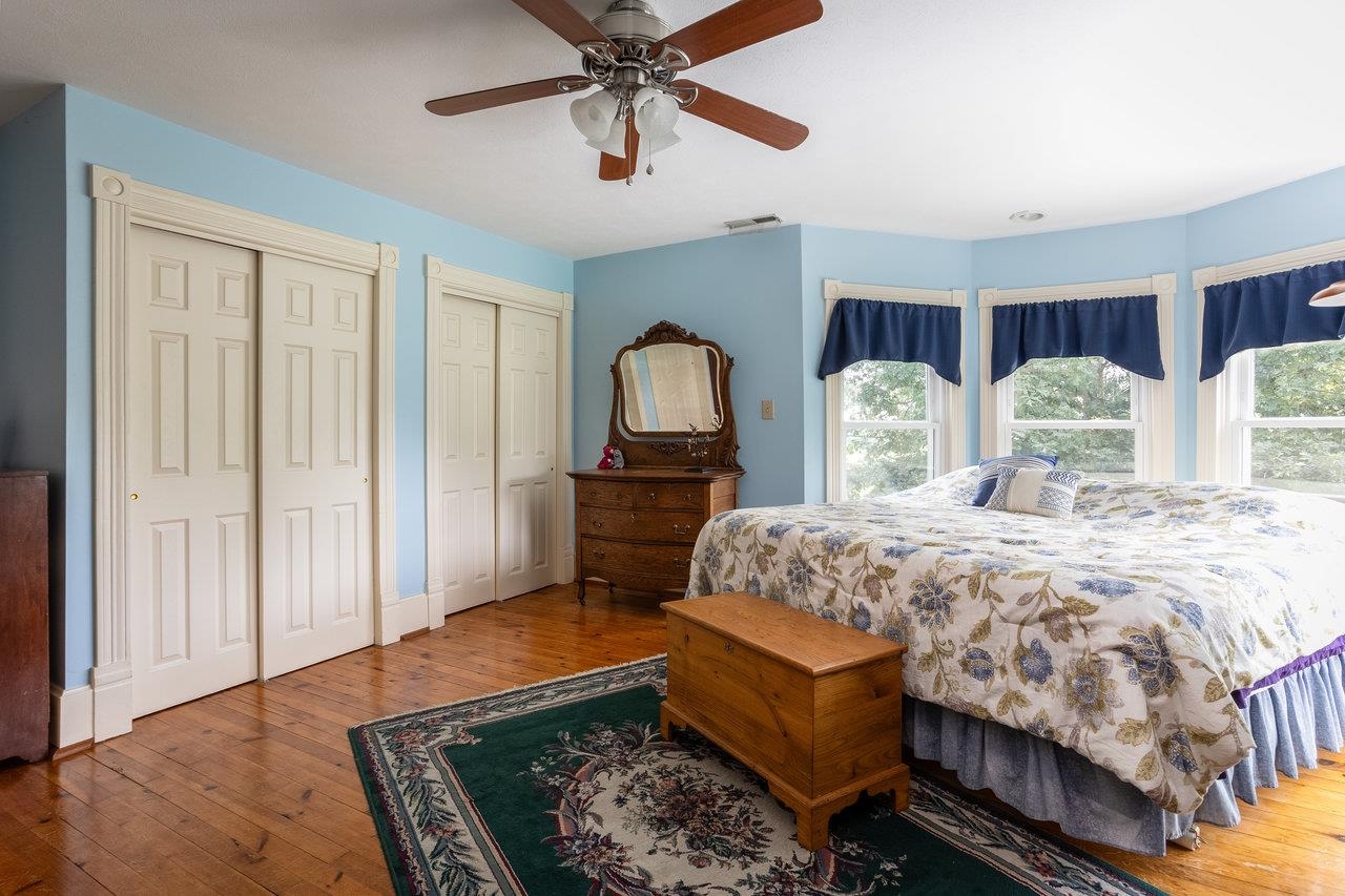 7231 Spring Creek Road Bridgewater, VA 22812 - Photo 29 of 74 a bed sitting in a spacious bedroom next to a window