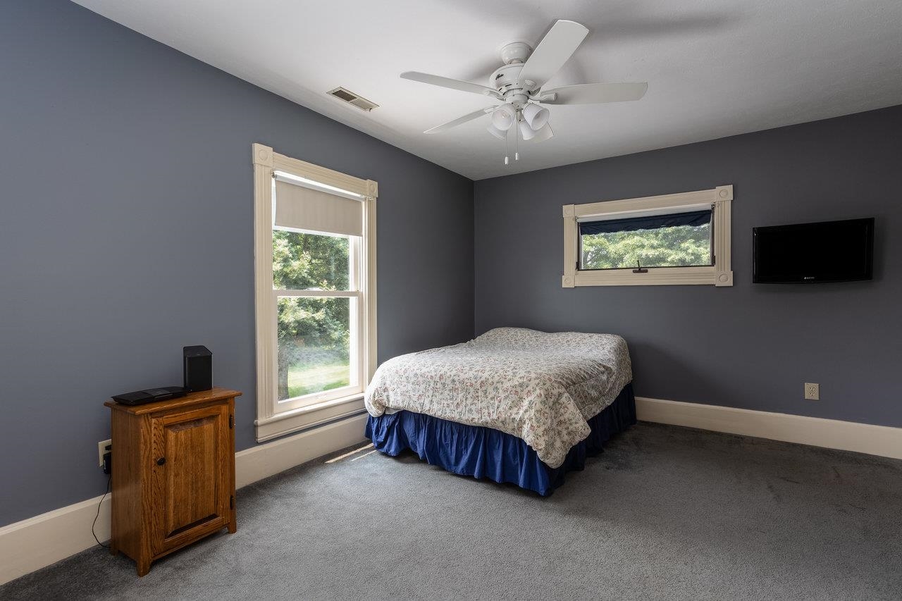 7231 Spring Creek Road Bridgewater, VA 22812 - Photo 33 of 74 a spacious bedroom with a bed and a window