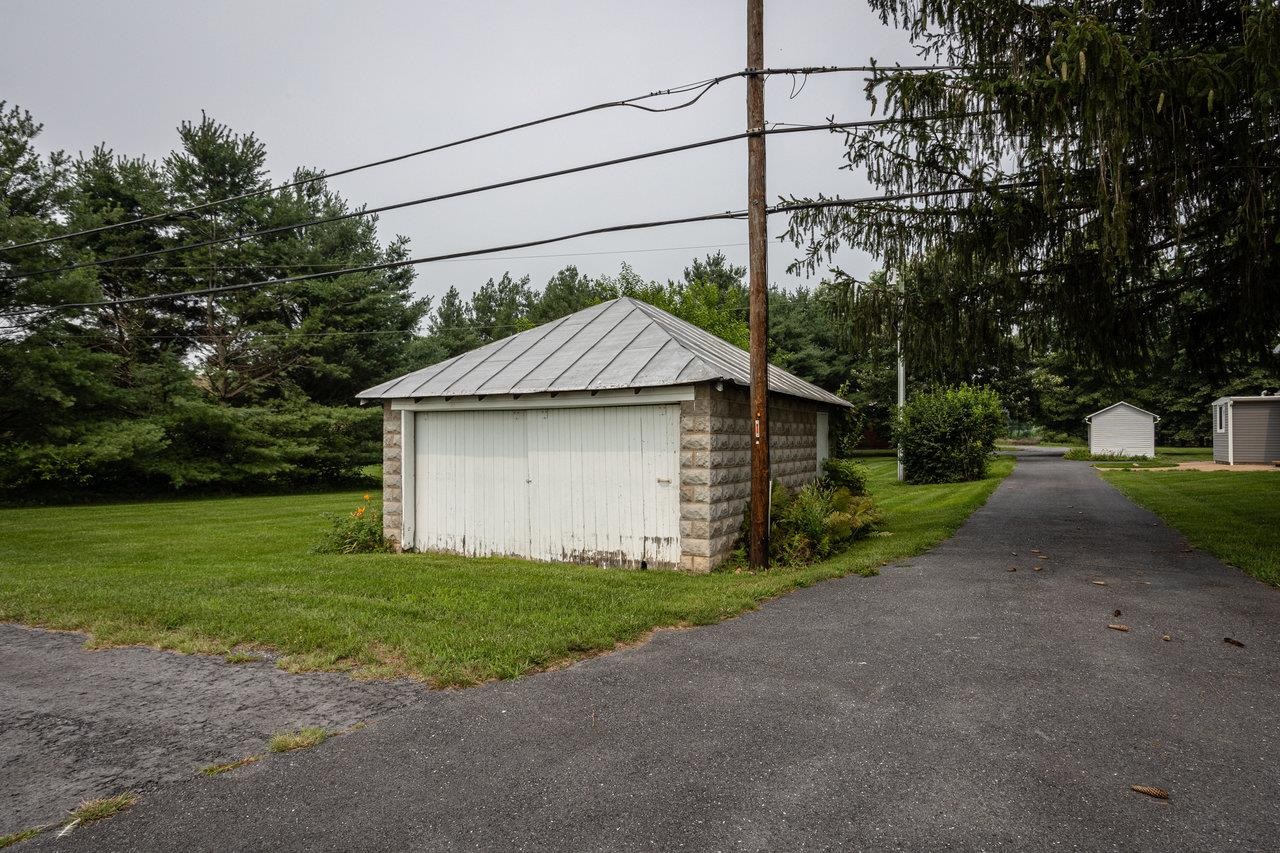 7231 Spring Creek Road Bridgewater, VA 22812 - Photo 45 of 74 a view of a house with a yard and garage