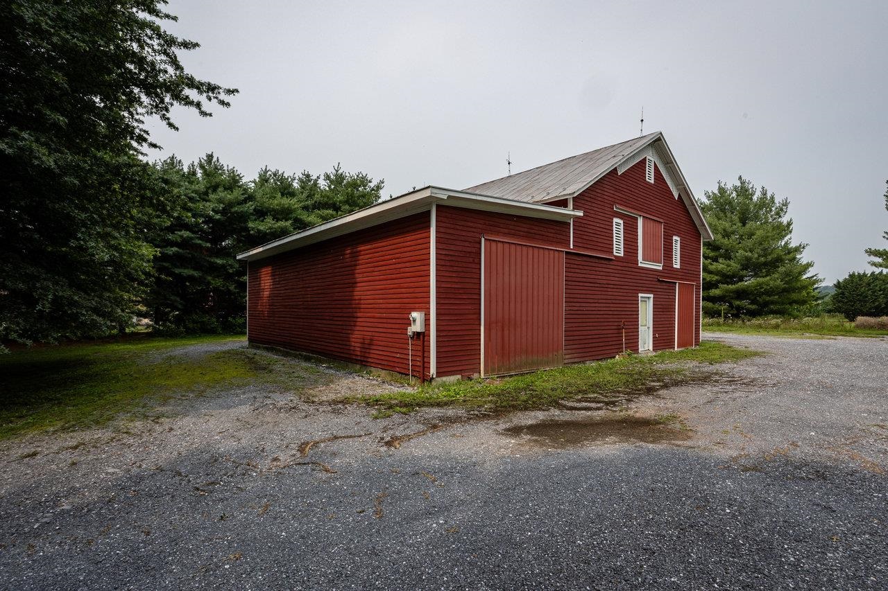7231 Spring Creek Road Bridgewater, VA 22812 - Photo 46 of 74 a view of a house with backyard and trees