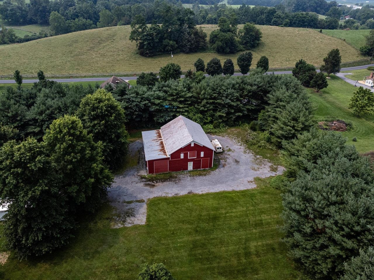 7231 Spring Creek Road Bridgewater, VA 22812 - Photo 69 of 74 an aerial view of a house with outdoor space and lake view