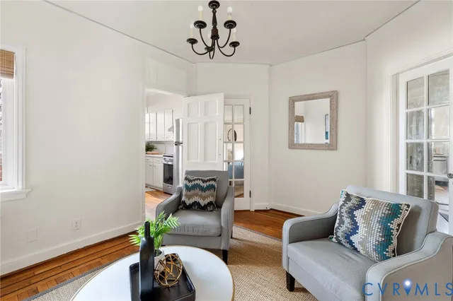 a living room with furniture or couch and a window