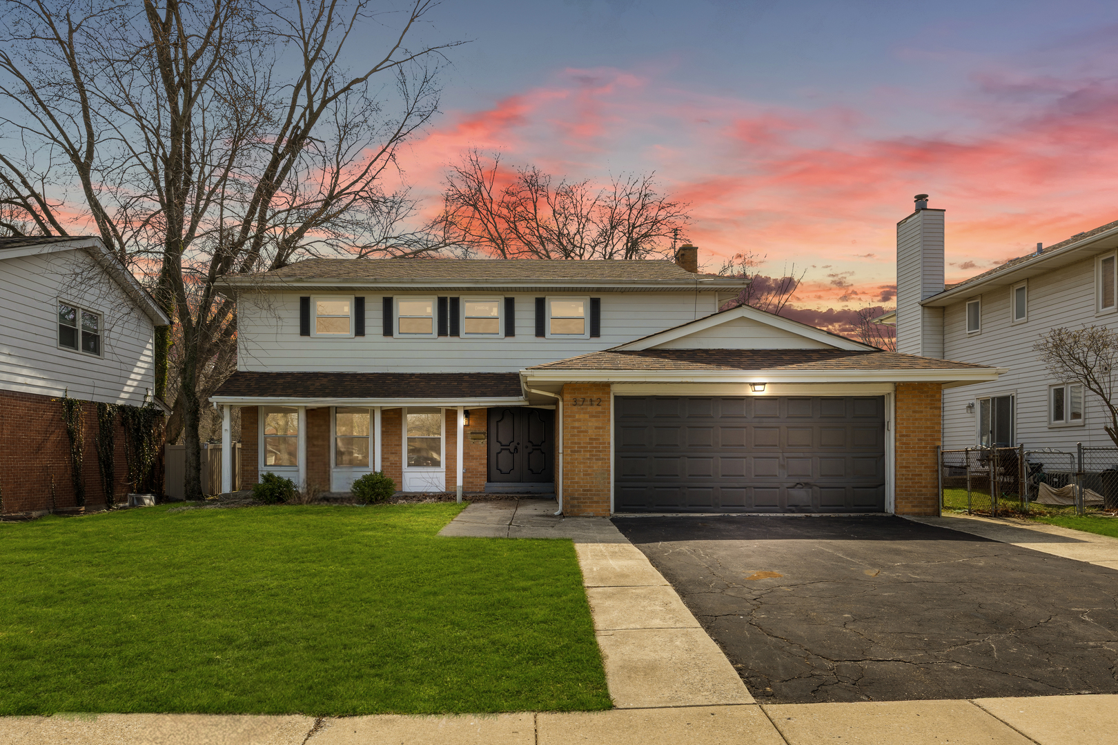 3712 Beech Street Flossmoor, IL 60422 - Photo 1 of 35 a front view of a house with a garden and yard