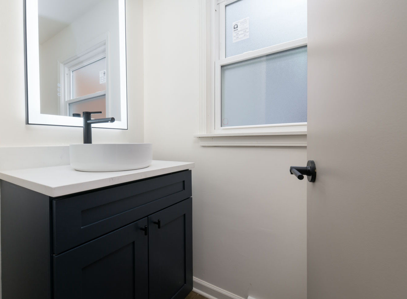 3712 Beech Street Flossmoor, IL 60422 - Photo 13 of 35 a bathroom with a sink vanity and a mirror