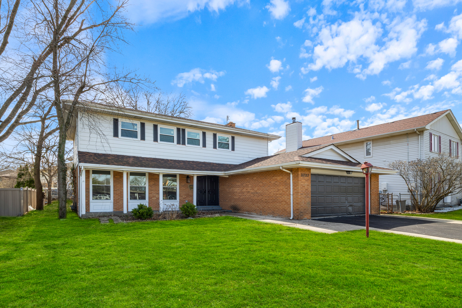 3712 Beech Street Flossmoor, IL 60422 - Photo 2 of 35 a view of a yard in front of house