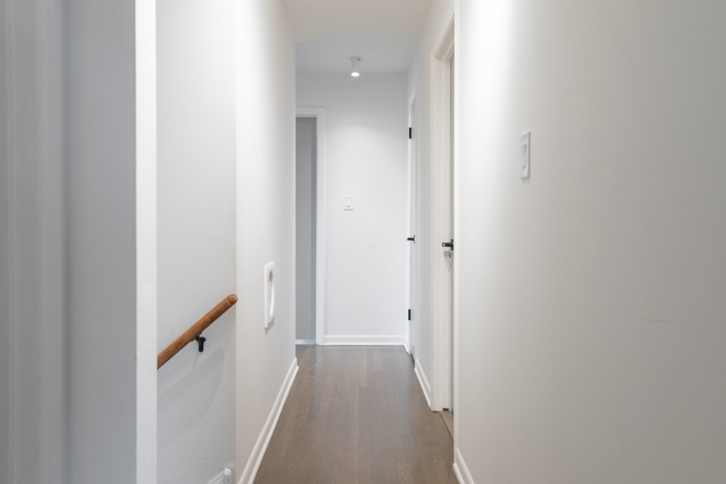 3712 Beech Street Flossmoor, IL 60422 - Photo 25 of 35 a view of a hallway with wooden floor and staircase