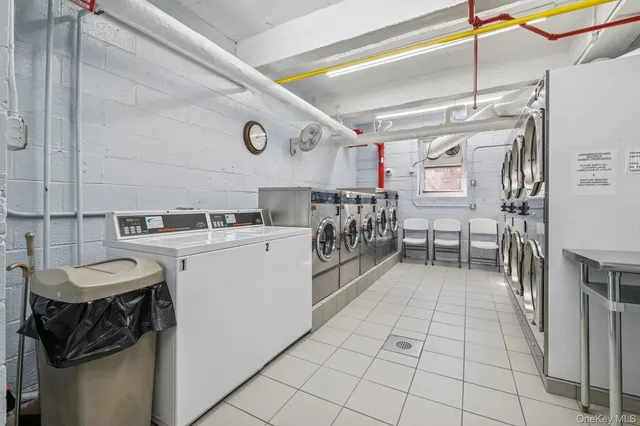 a kitchen with a sink and a stove top oven