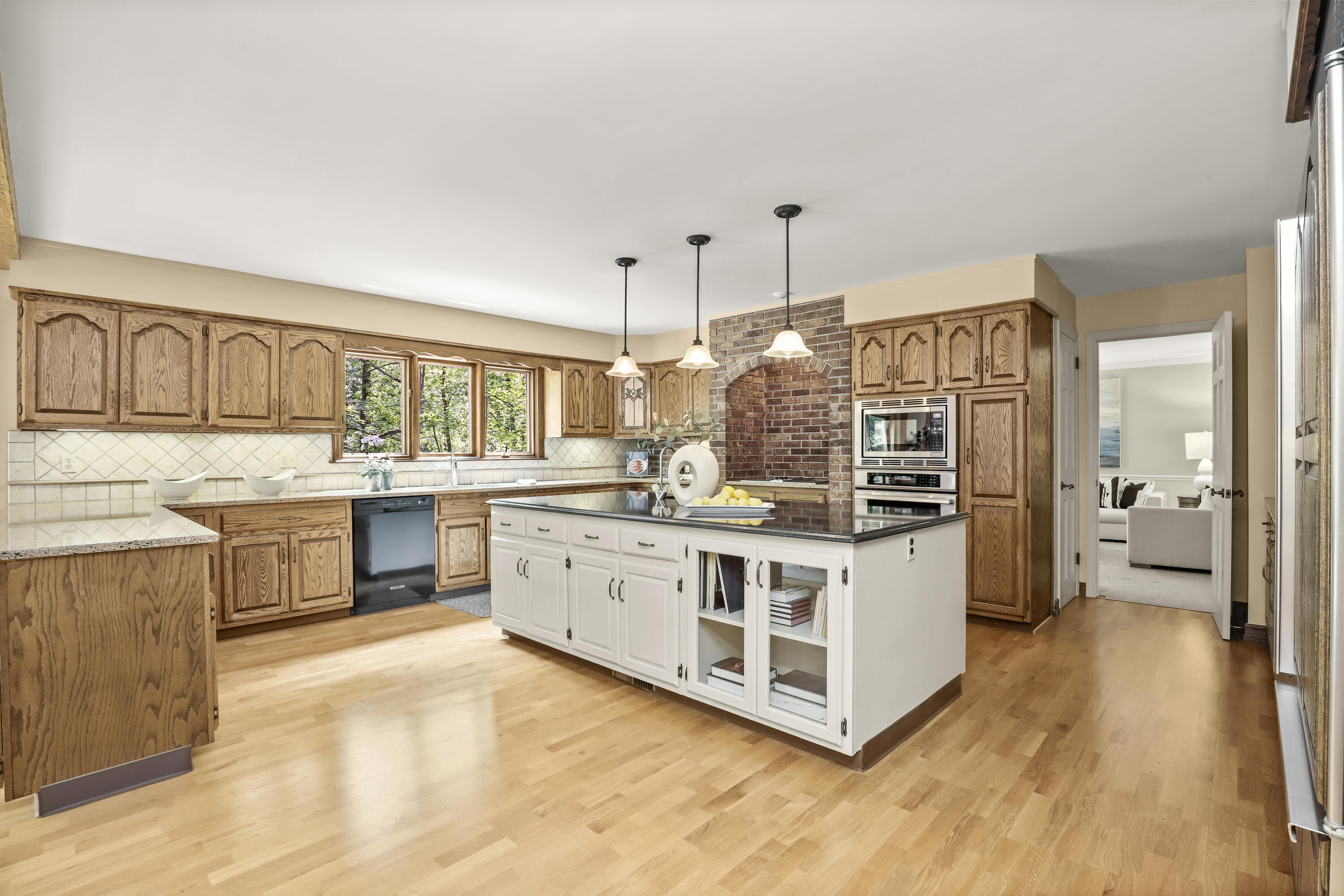 37 Long Lots Road New Canaan, CT 06840 - Photo 15 of 42 a kitchen with stainless steel appliances a white cabinets and wooden floor