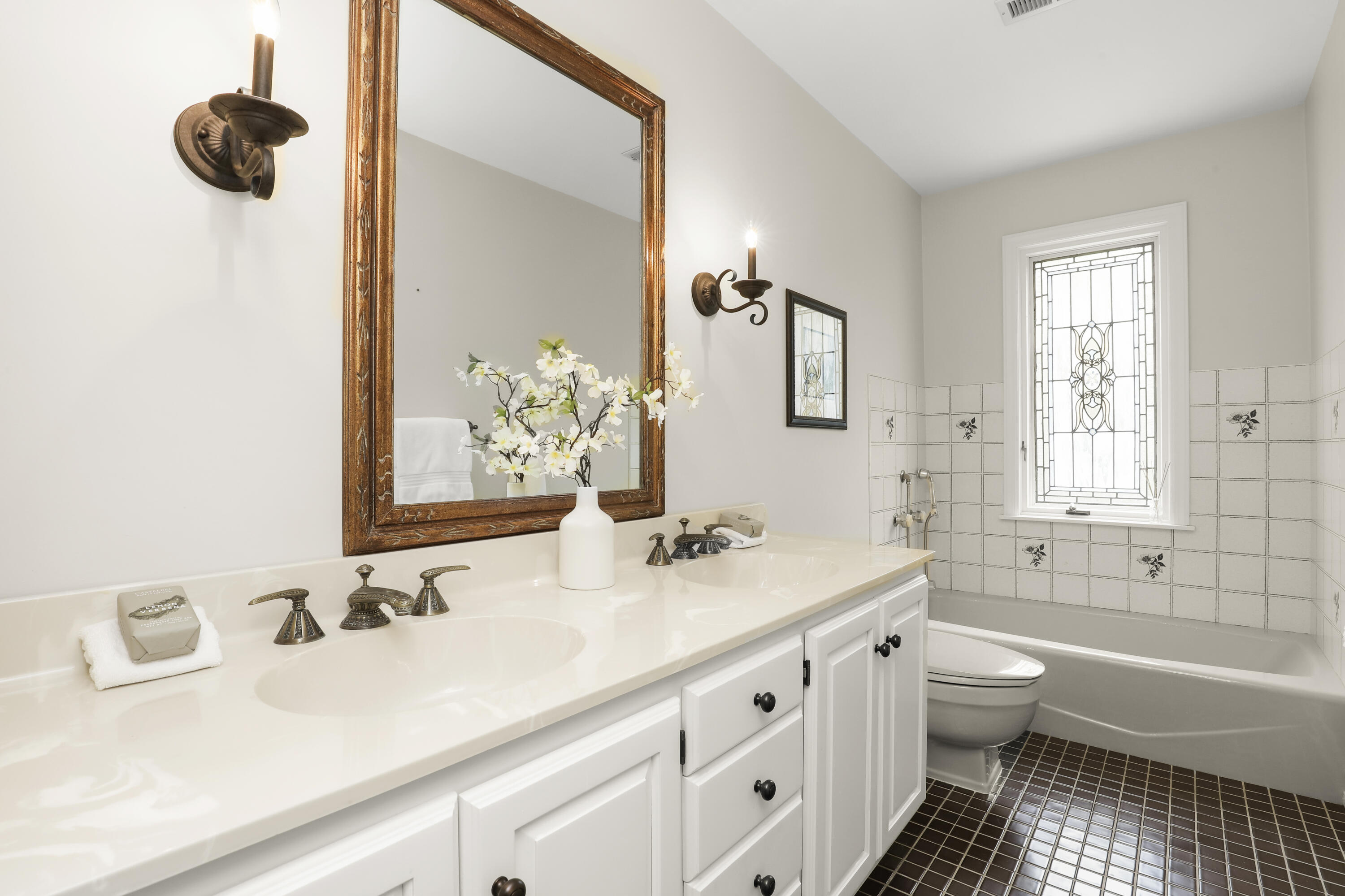37 Long Lots Road New Canaan, CT 06840 - Photo 35 of 42 a bathroom with a sink and a mirror